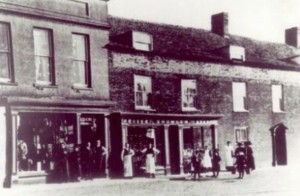 AOS P 1535 john robert Showler’s grocery shop and staff, in west st Crowland 1900s.