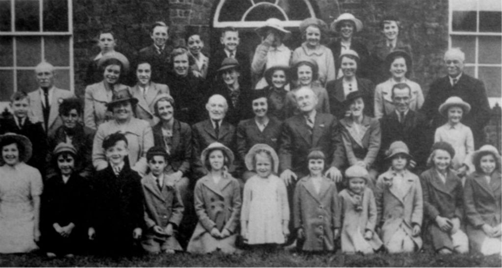 AOS P 2886 group outside the united methodist chapel, weston hills 1935