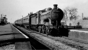 AOS P 2785 twenty railway station, J6 No'64172 heading east. 1950s