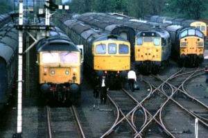 AOS P 3212 sidings at spalding railway station poss 1979. view from footbridge Class 47 class 33 class 31 and 37 and a DMU and ever inch of track is full.